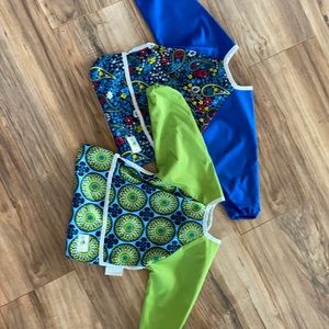 2 Baby Basics full body bibs.